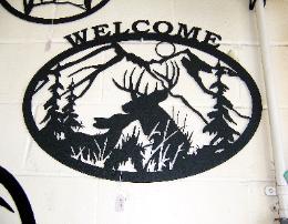 Metal wildlife welcome signs by plasma designs.