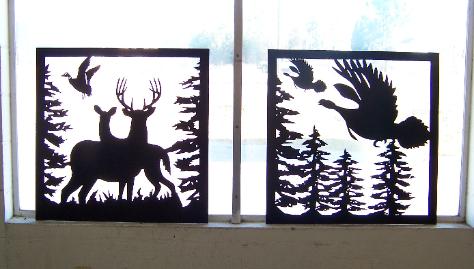 Deer and turkey signs and metal silhouettes