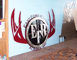 Custom metal signs by Plasma Designs.