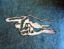 metal hand pointing for wall art and custom metal designs.