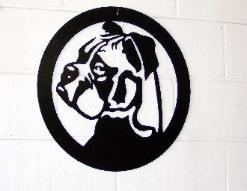 Metal wall art of a boxer.